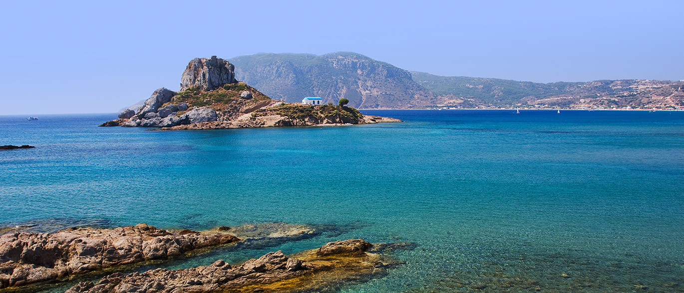 Agios Stefanos: Pláž na ostrově Kos skýtá výhled na ostrůvek Kastri